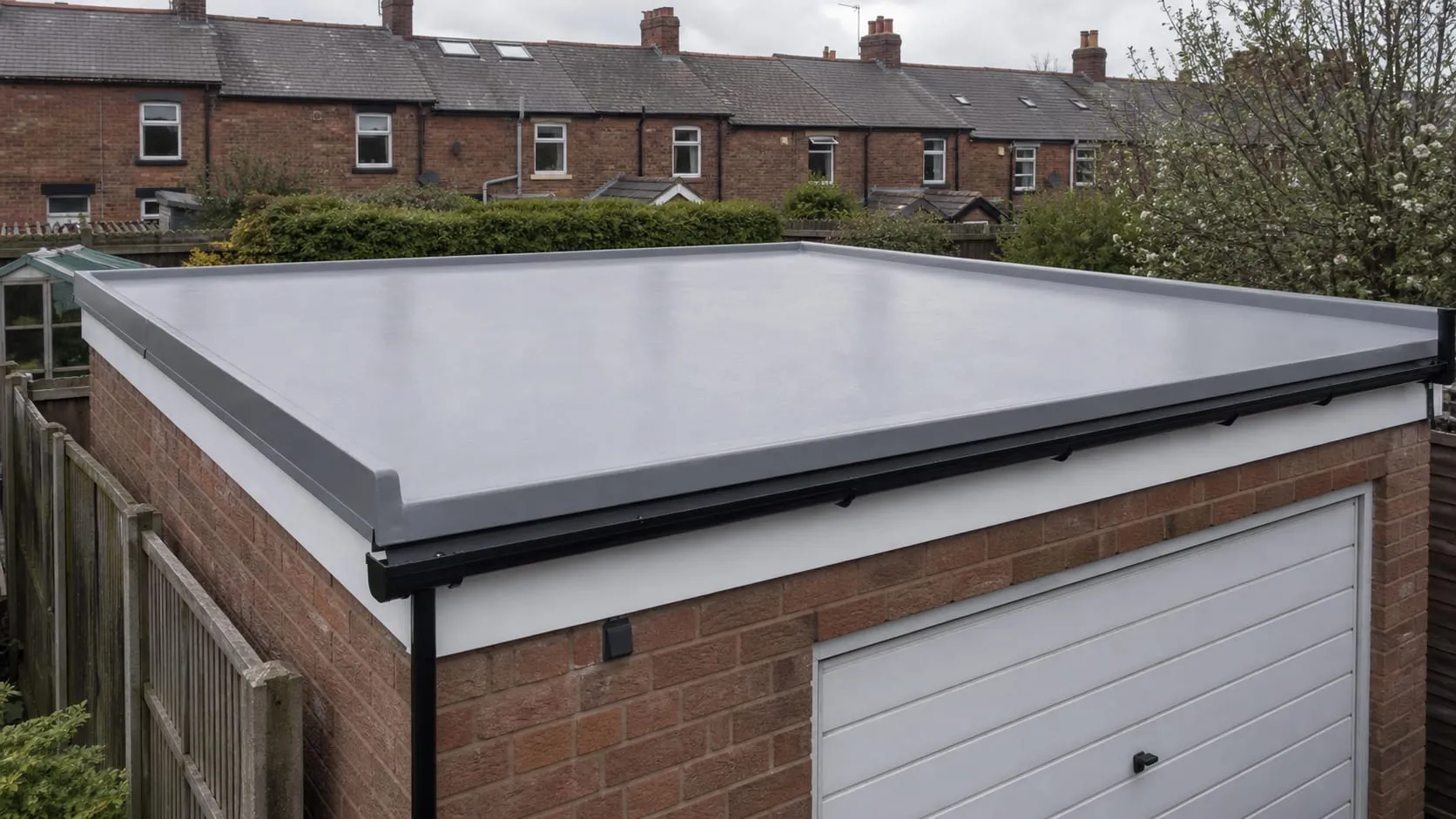 A completed GRP fibreglass garage roof, smooth and seamless with a moulded edge trim.